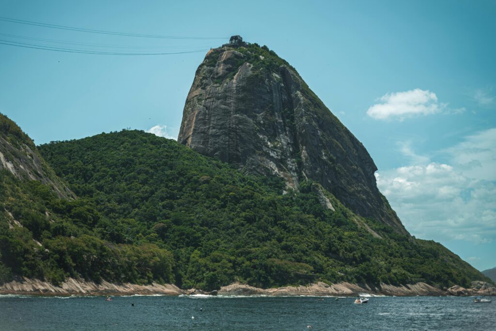 pexels photo 30540841 30540841 Breathtaking landscape of Sugarloaf Mountain near Rio de Janeiro with ocean and lush greenery.
